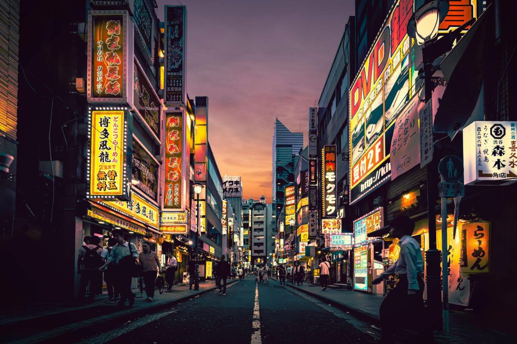 How to choose right business, Explore the vibrant nightlife of Shibuya, Tokyo, showcasing neon-lit streets bustling with activity after sunset.